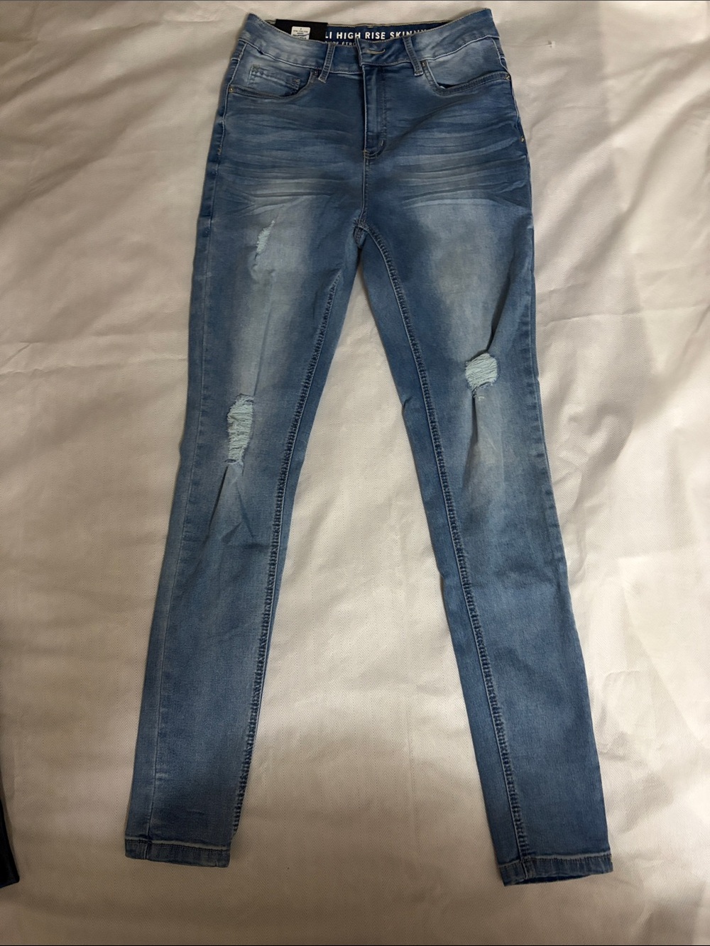 High Rise Skinny Jeans - Light Blue Distressed